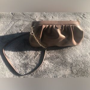 A new day dumpling clutch bag . Taupe brown